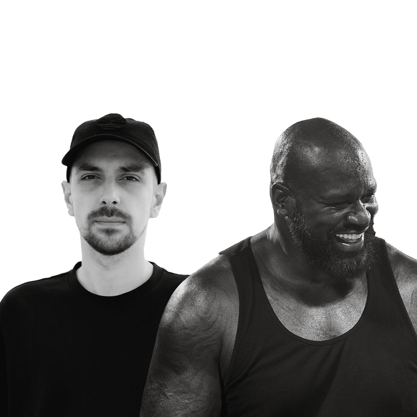 both artist posing together admist a white background